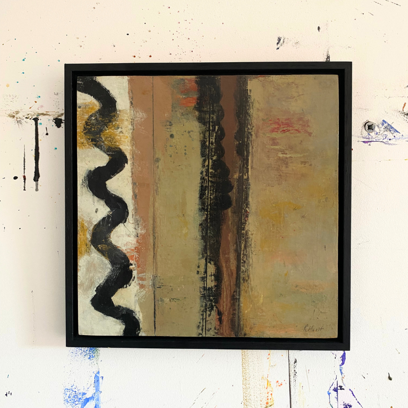 Echoes of Petworyh, A framed abstract painting on wood with vertical textured bands in beige, brown, black, and muted red, hung against a white wall with paint splatters.